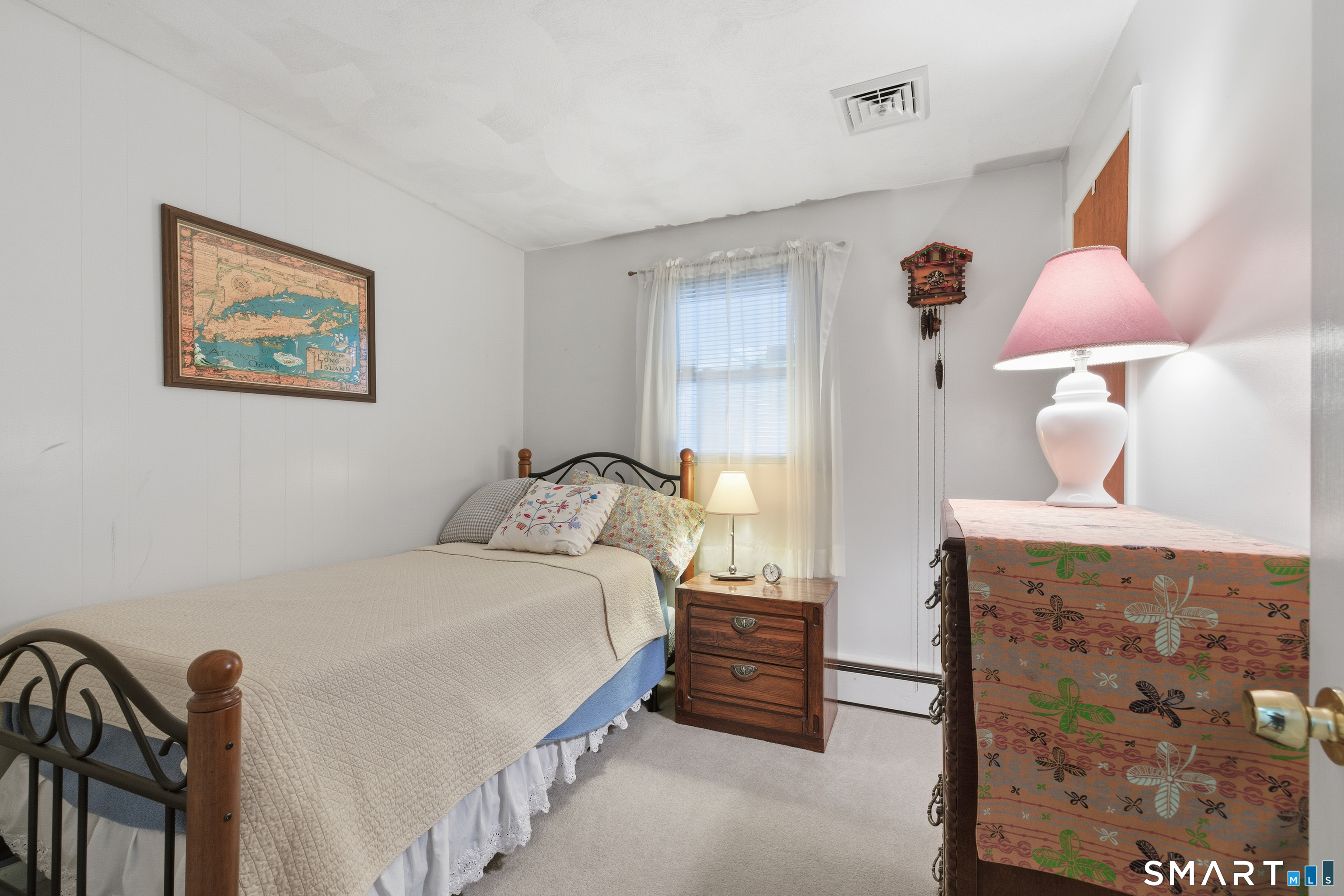 32 Richard Road Ledyard, CT 06335 - Photo 16 of 32 a bedroom with a bed and a lamp on dresser