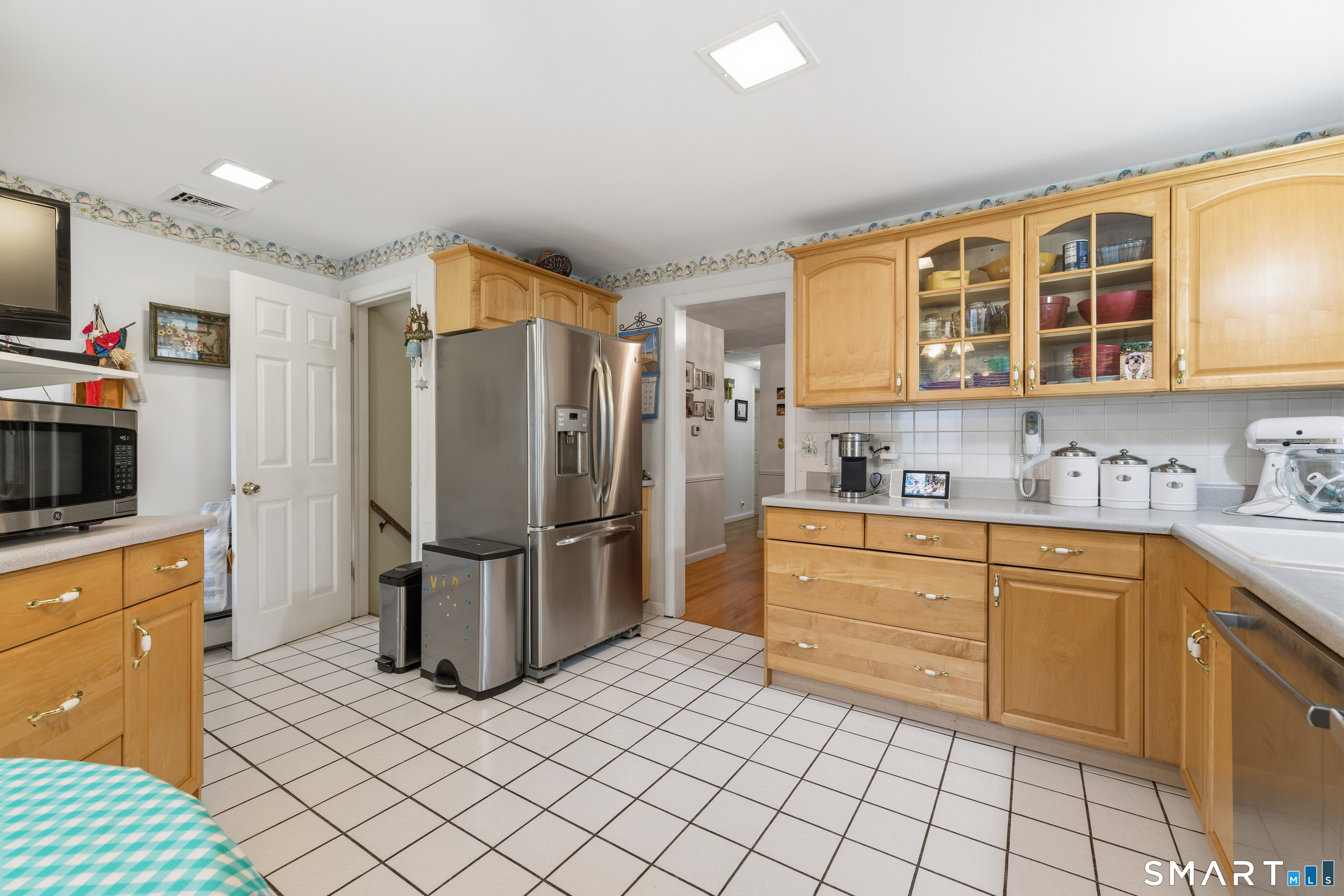 32 Richard Road Ledyard, CT 06335 - Photo 23 of 32 a kitchen with a refrigerator sink and cabinets