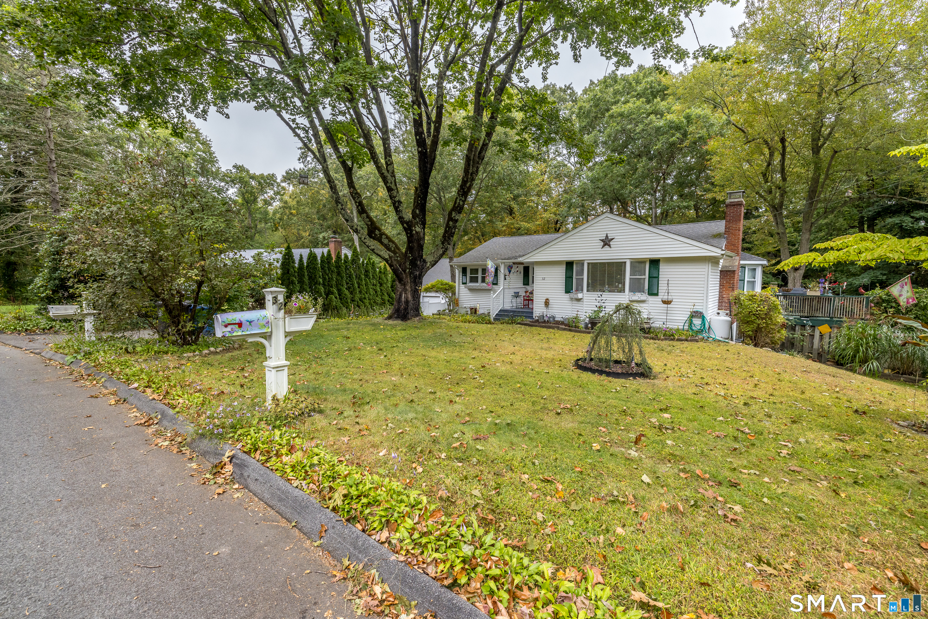 32 Richard Road Ledyard, CT 06335 - Photo 4 of 32 a view of a house with swimming pool and a yard