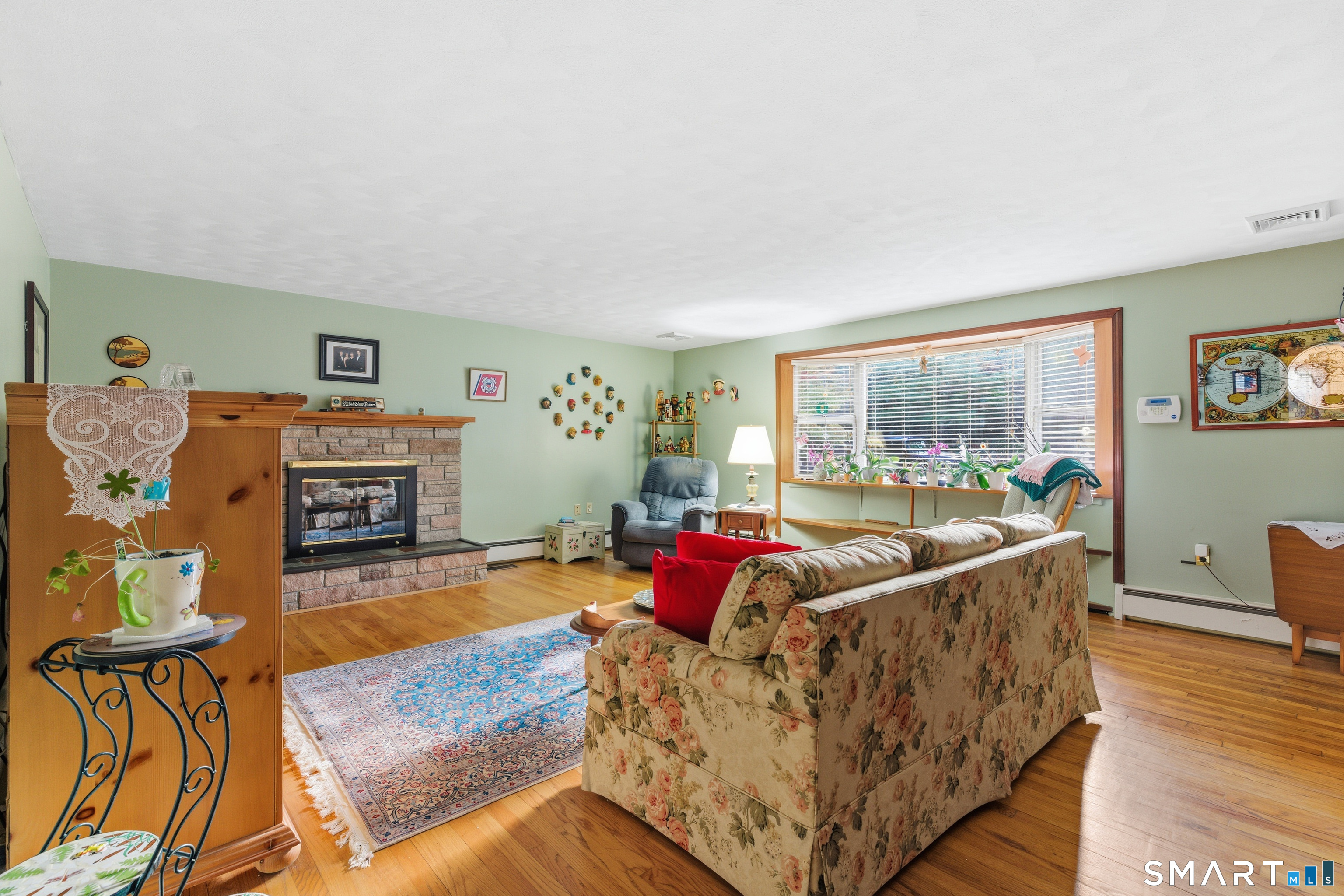 32 Richard Road Ledyard, CT 06335 - Photo 10 of 32 a living room with furniture and a flat screen tv