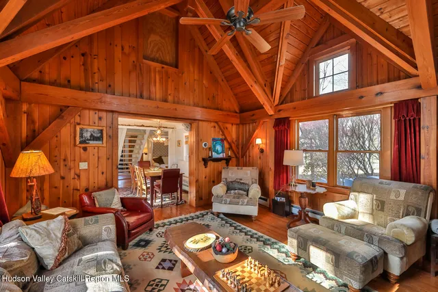 a outdoor living space with furniture and a fireplace