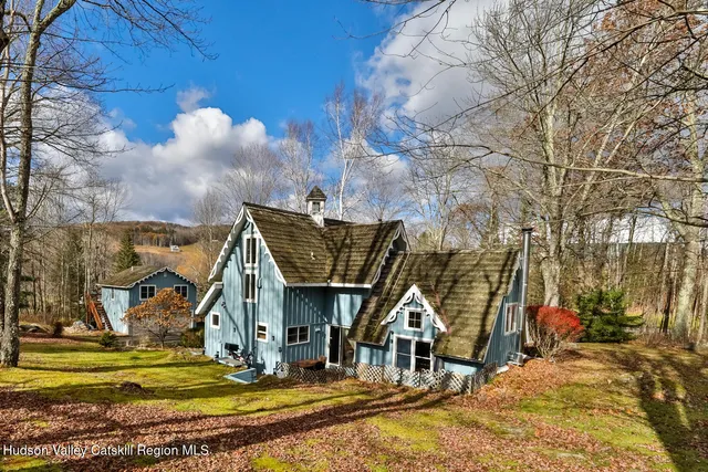 a view of a house with a park
