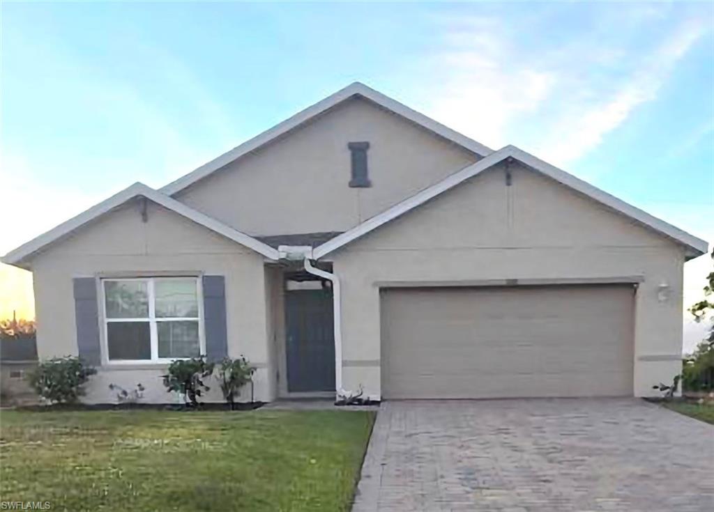 a front view of house with yard