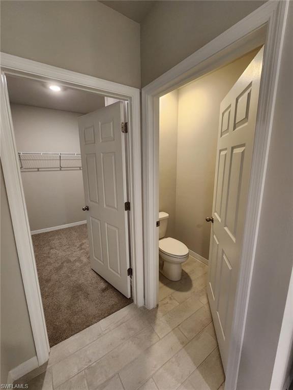 2320 Thurlow Street Alva, FL 33920 - Photo 11 of 11 a bathroom with a toilet and a shower