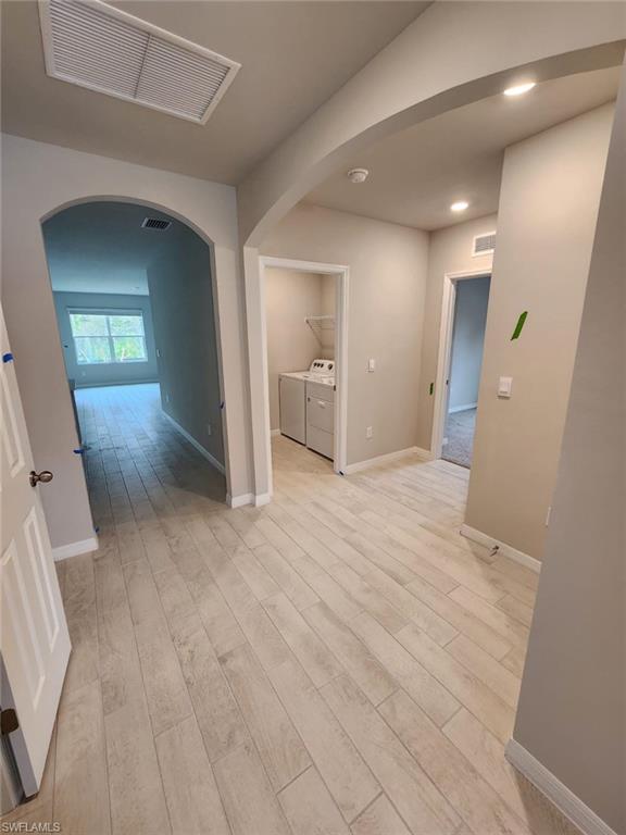2320 Thurlow Street Alva, FL 33920 - Photo 6 of 11 a view of a hallway with wooden floor and staircase