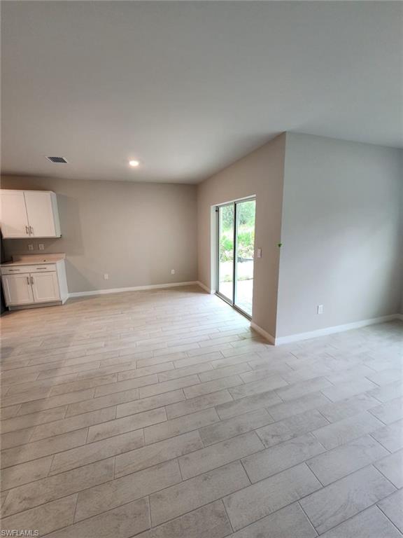 2320 Thurlow Street Alva, FL 33920 - Photo 9 of 11 a view of an empty room with a window