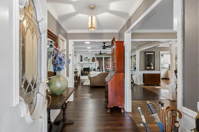 a view of a livingroom with furniture and a window