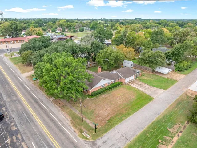 a view of a garden with an outdoor space