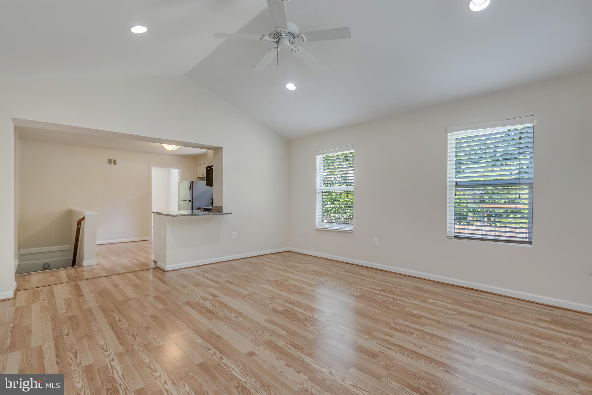 11603 Gail Street Silver Spring, MD 20902 - Photo 11 of 19 wooden floor in an empty room with a window