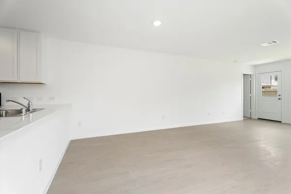 a view of a kitchen with a sink