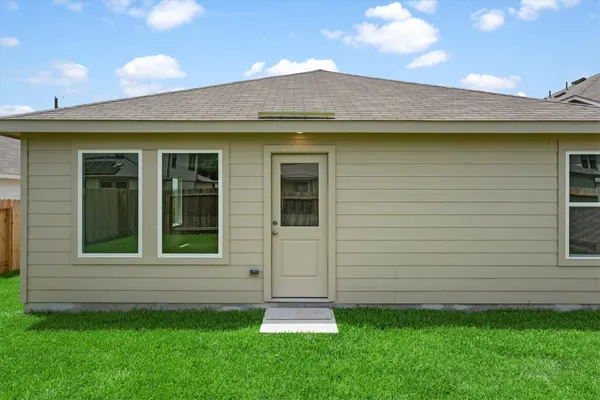 a view of a backyard with a garden
