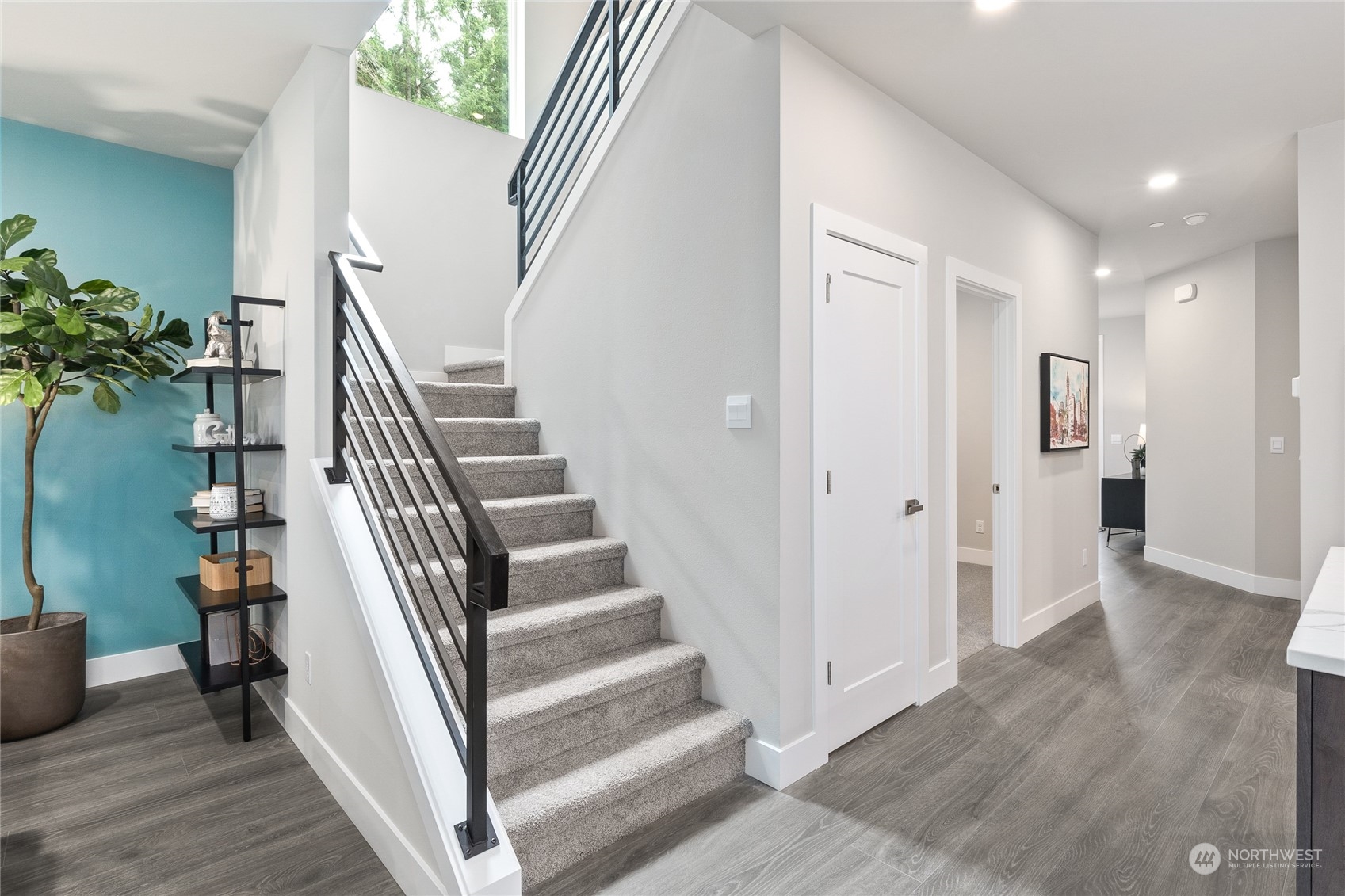 23 177th St S West Bothell, WA 98012 - Photo 17 of 32 a view of entryway with wooden floor and stairs