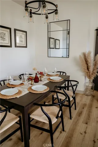 a living room with furniture and flat screen tv