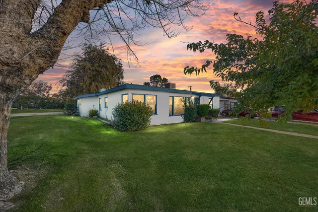 a view of a house with a big yard