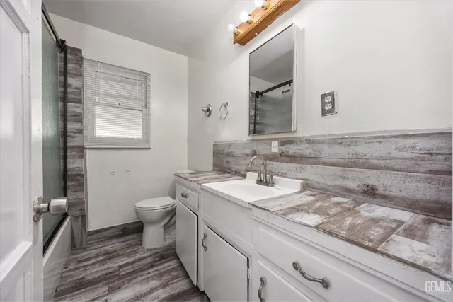 a bathroom with a sink and a toilet