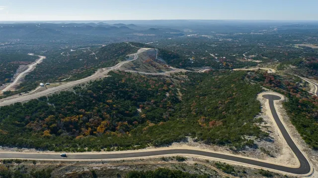 a view of a yard from a balcony
