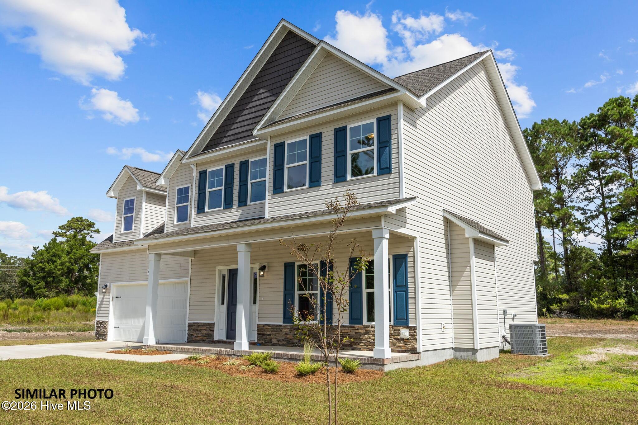 814 Sandy Shr Court, Unit 102 Holly Ridge, NC 28445 - Photo 2 of 26 3-web-or-mls-IMG_0359