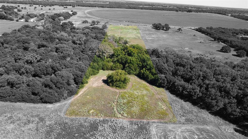 226 County Road 226 Rising Star, TX 76471 - Photo 2 of 25 a view of a yard with wooden fence