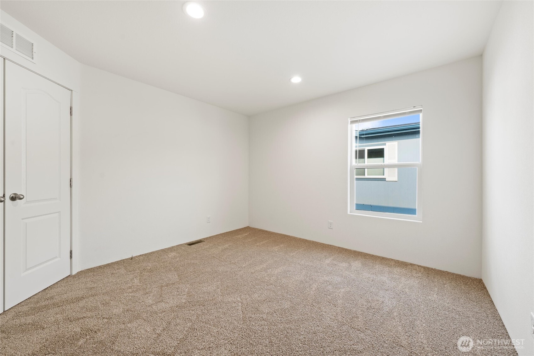 1701 Burr Avenue, Unit 51 Moses Lake, WA 98837 - Photo 20 of 35 a view of an empty room with a window