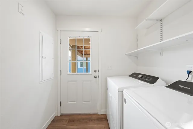 a utility room with dryer and washer