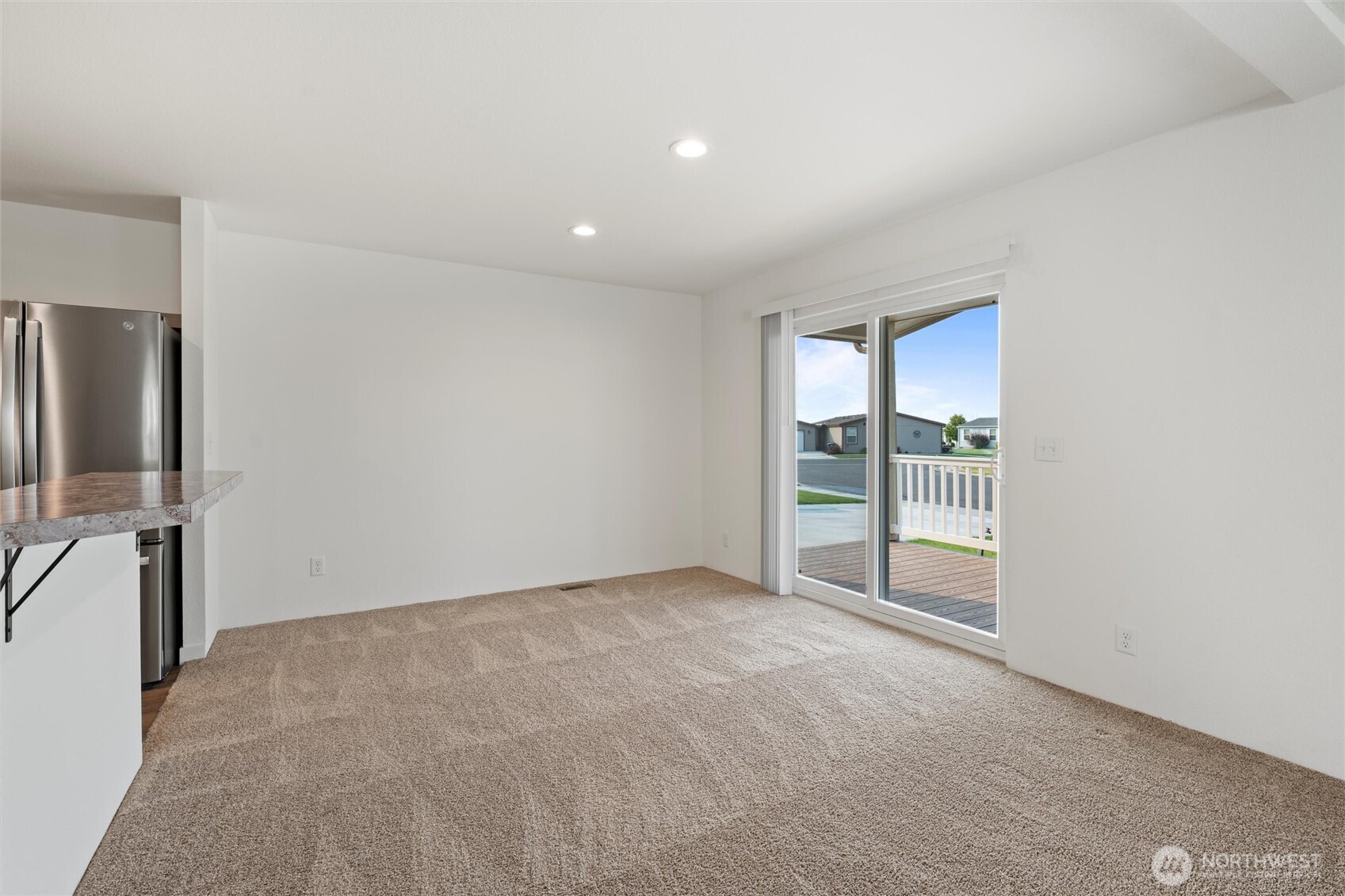 1701 Burr Avenue, Unit 51 Moses Lake, WA 98837 - Photo 10 of 35 a view of an empty room with a window