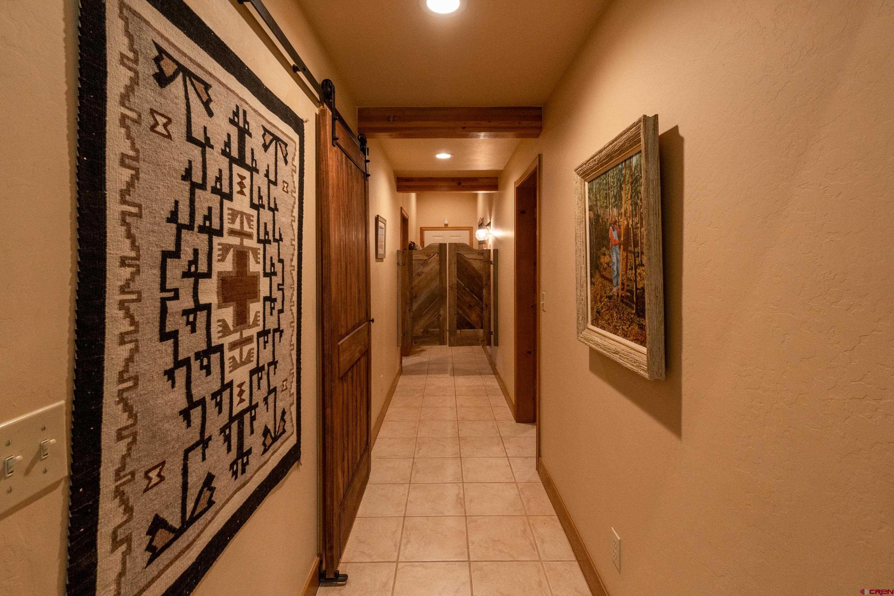 104 River Run Durango, CO 81301 - Photo 13 of 34 a view of a entryway door with wooden floor