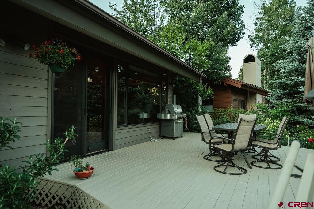 104 River Run Durango, CO 81301 - Photo 26 of 34 a view of backyard with outdoor seating and plants