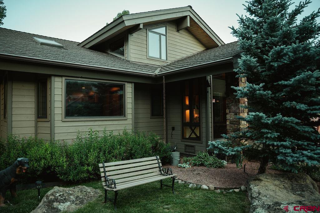 104 River Run Durango, CO 81301 - Photo 32 of 34 a front view of a house with a yard
