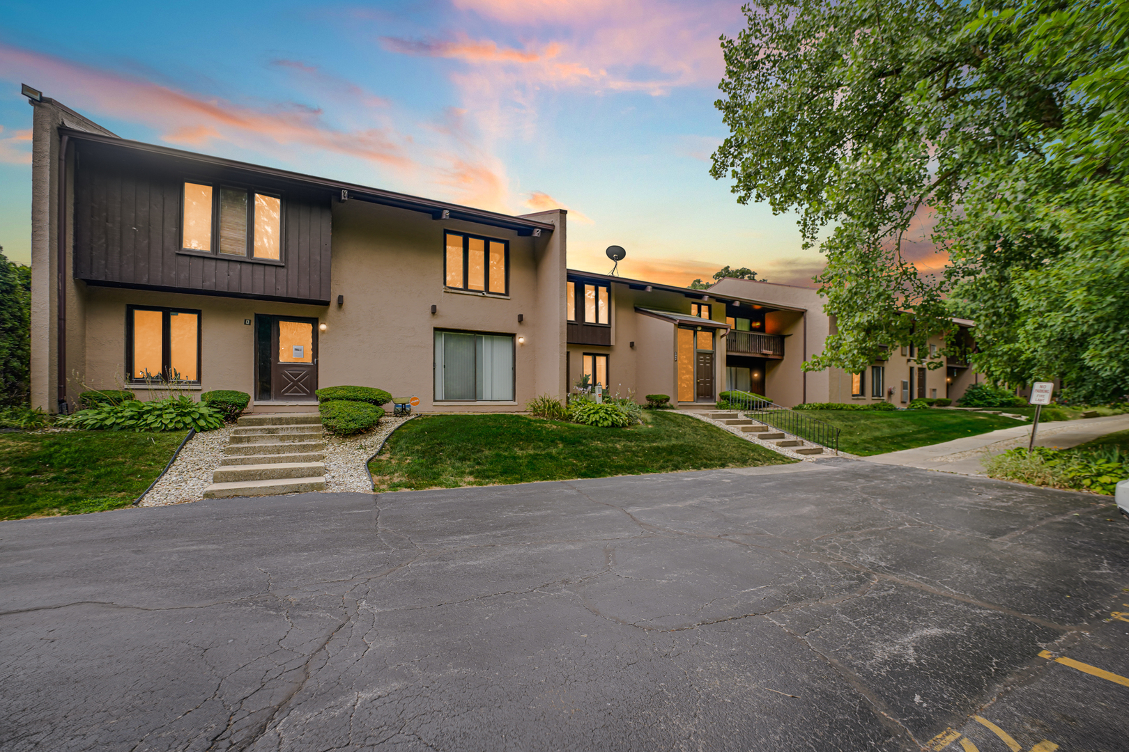 1100 Holbrook Road, Unit D Homewood, IL 60430 - Photo 15 of 16 a front view of a house with a yard and garage