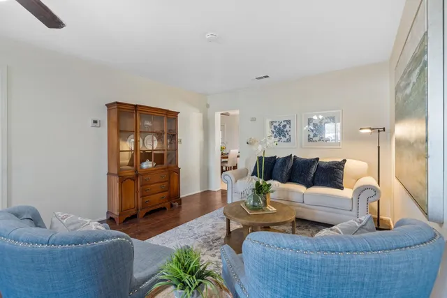 a kitchen with a sink appliances and cabinets