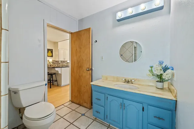 a view of a swimming pool with a sitting space