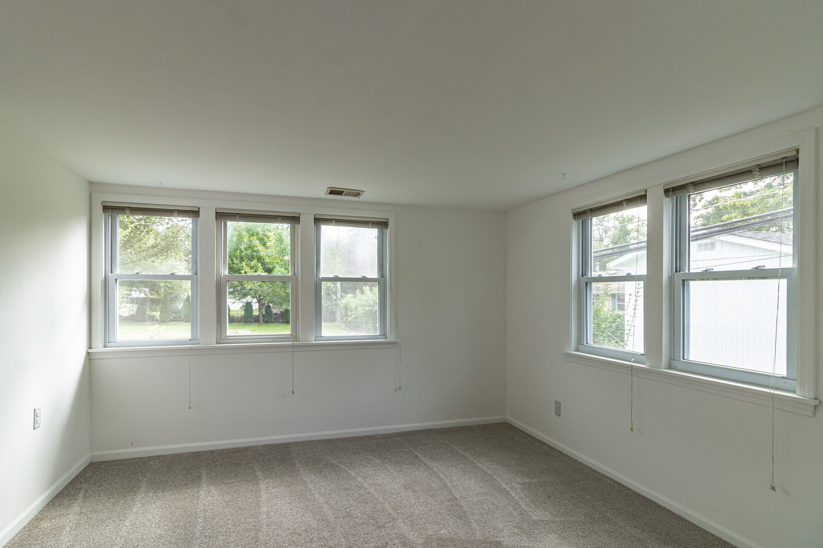 18229 West Big Oaks Road Grayslake, IL 60030 - Photo 13 of 22 an empty room with a window