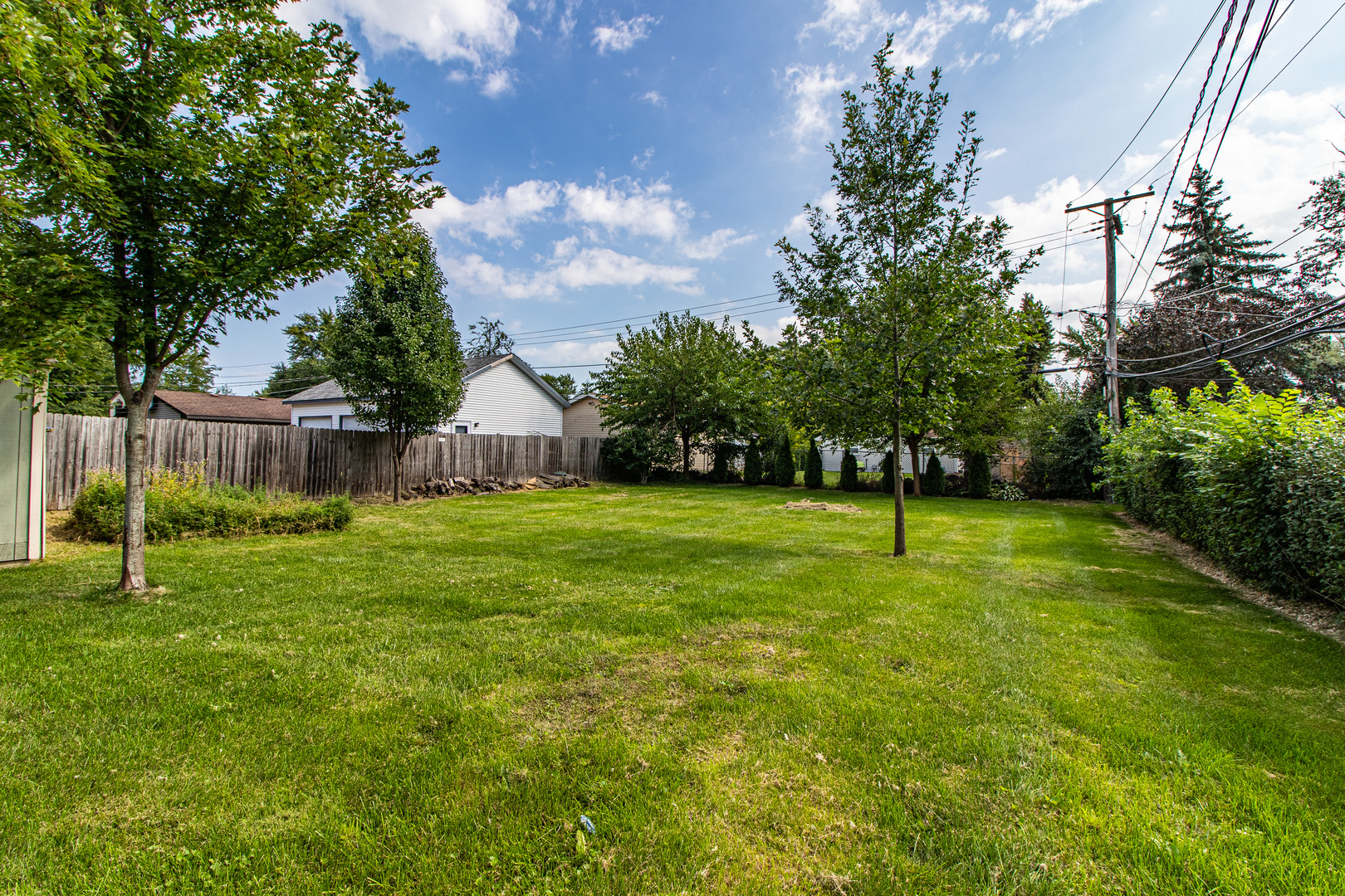 18229 West Big Oaks Road Grayslake, IL 60030 - Photo 21 of 22 a view of a house with a backyard