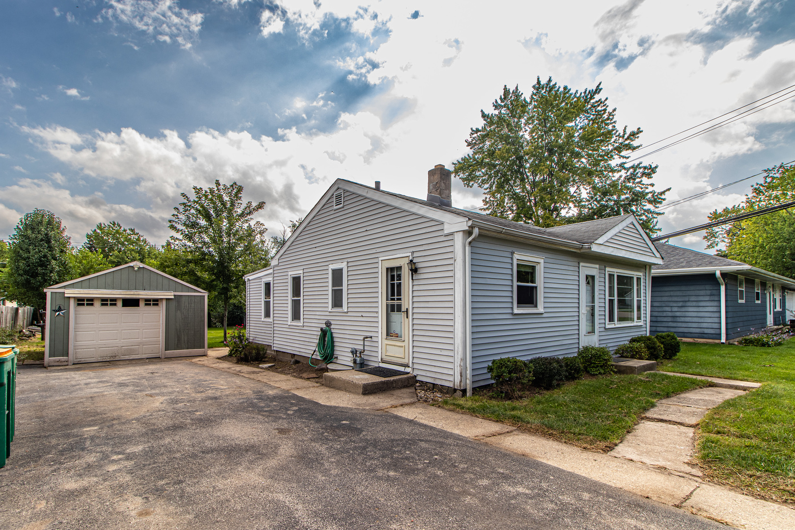 18229 West Big Oaks Road Grayslake, IL 60030 - Photo 22 of 22 a view of a house with a yard and large tree