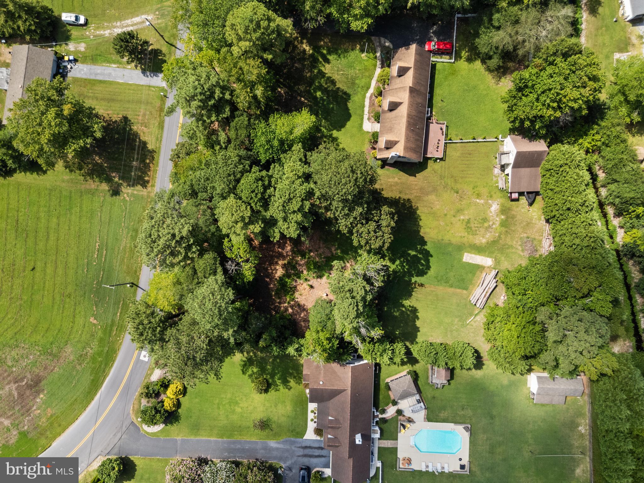 Lot 3 Club House Drive Ocean View, DE 19970 - Photo 8 of 13 an aerial view of residential house with outdoor space and trees all around