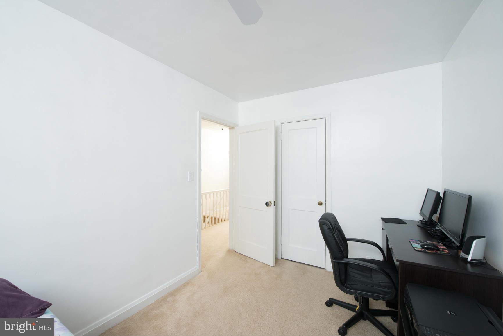 8331 Kavanagh Road Baltimore, MD 21222 - Photo 16 of 28 a view of a workspace with furniture and a window