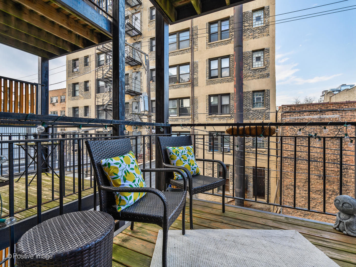 512 West Barry Avenue, Unit 312 Chicago, IL 60657 - Photo 12 of 12 a view of a chairs and table in the balcony