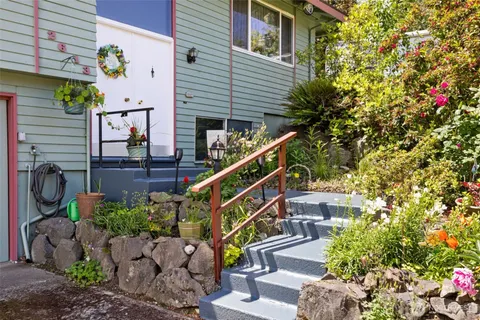 a house view with a garden space