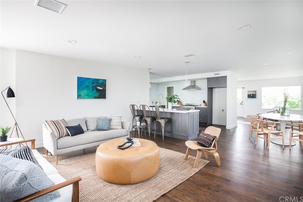 453 Broadway Costa Mesa, CA 92627 - Photo 1 of 39 a living room with furniture and wooden floor