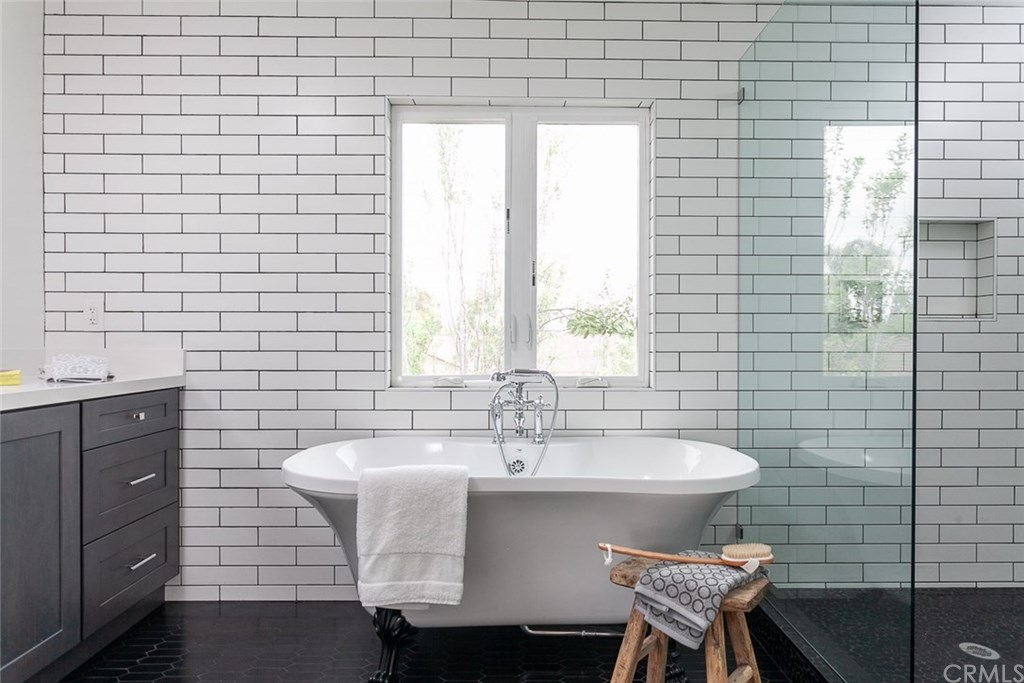 453 Broadway Costa Mesa, CA 92627 - Photo 21 of 39 a bathroom with a sink and a mirror