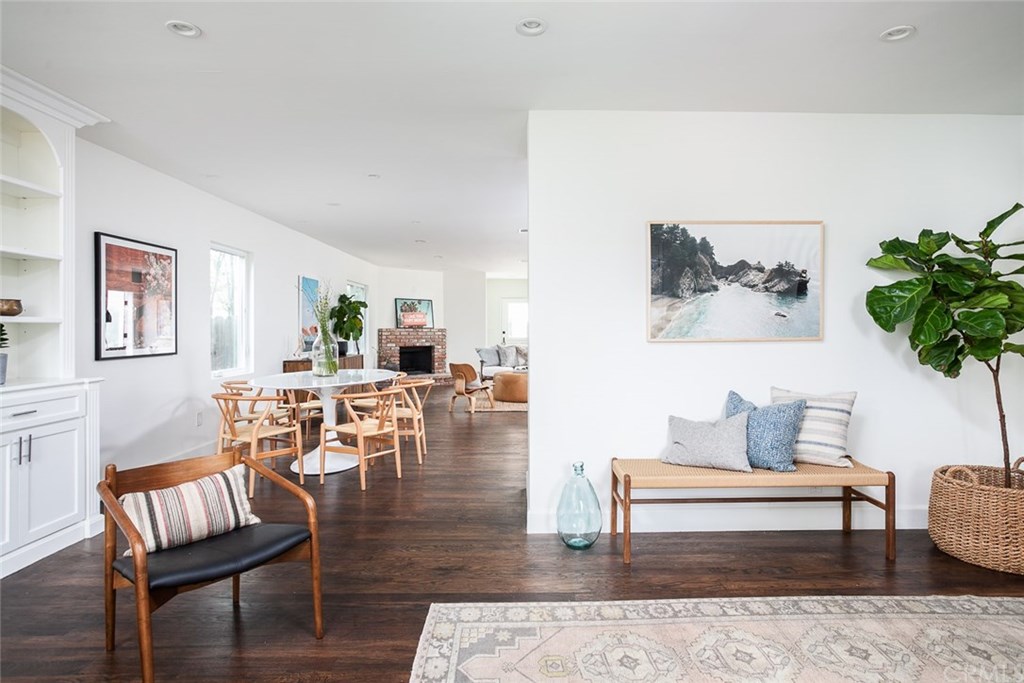 453 Broadway Costa Mesa, CA 92627 - Photo 7 of 39 a living room with furniture and wooden floor