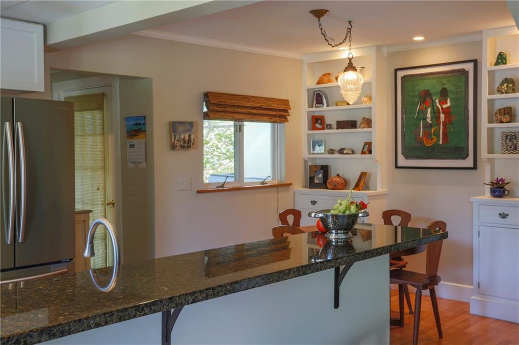 8 Pierce Street, Unit A Belfast, ME 04915 - Photo 14 of 34 view toward dining area. Door to...