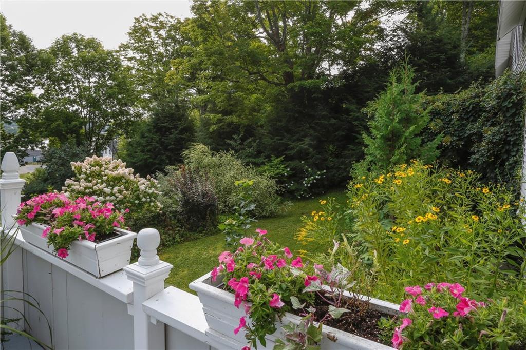 8 Pierce Street, Unit A Belfast, ME 04915 - Photo 5 of 34 Deck and garden in full bloom!