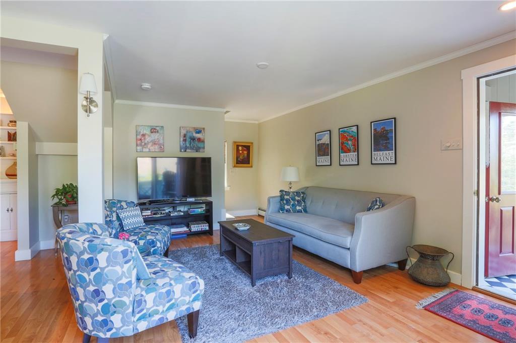 8 Pierce Street, Unit A Belfast, ME 04915 - Photo 9 of 34 Living room (see entry door on...