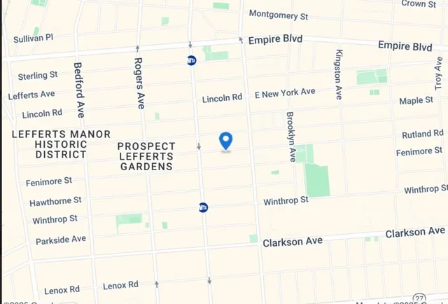 a view of a backyard of the house