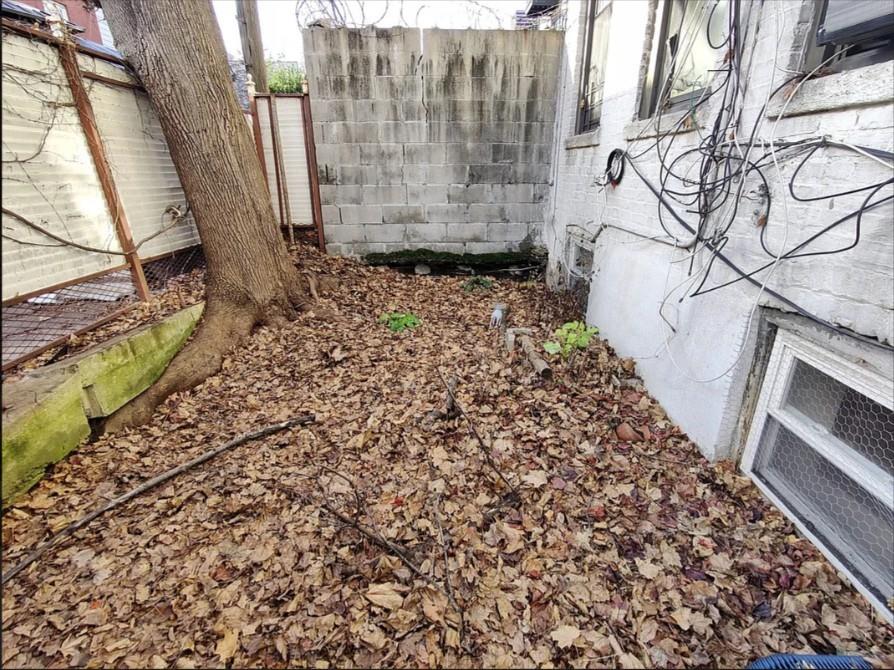 354 Rutland Road Brooklyn, NY 11225 - Photo 14 of 50 a view of a backyard of the house