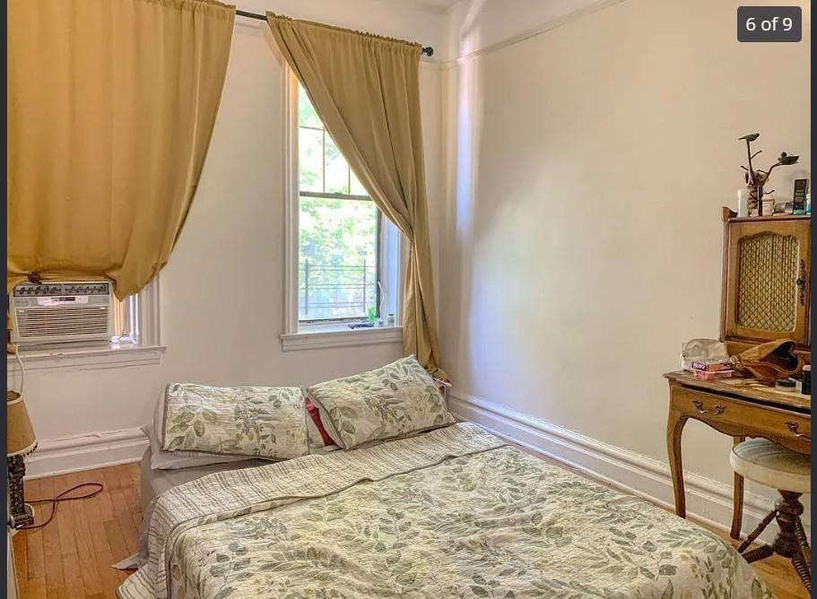 354 Rutland Road Brooklyn, NY 11225 - Photo 41 of 50 a bedroom with a bed and a window