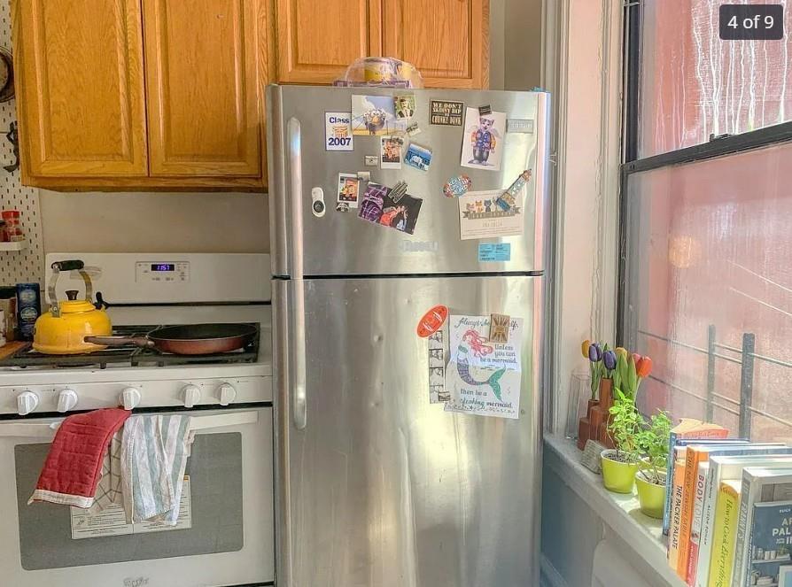 354 Rutland Road Brooklyn, NY 11225 - Photo 43 of 50 a kitchen with stainless steel appliances granite countertop a refrigerator and a stove