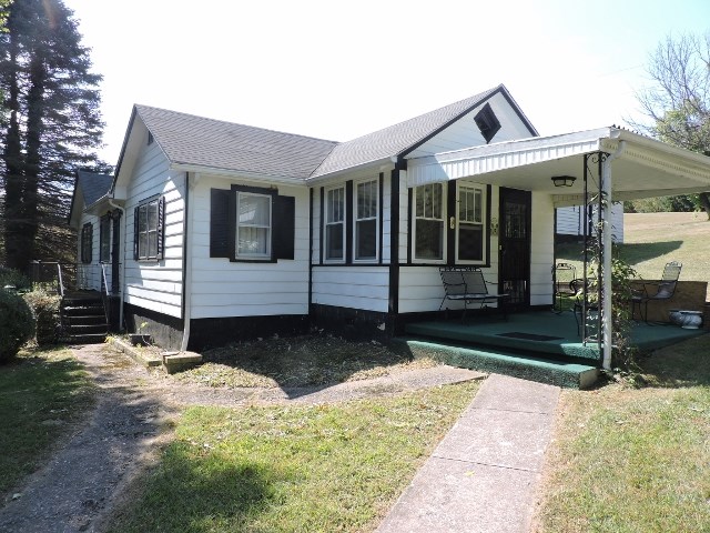 559 Lofton Road Raphine, VA 24472 - Photo 1 of 17 a front view of a house with a yard