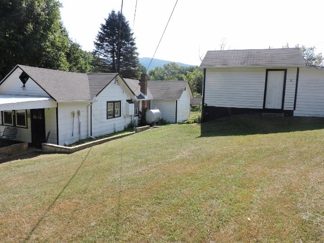 559 Lofton Road Raphine, VA 24472 - Photo 9 of 17 a view of a house with a backyard